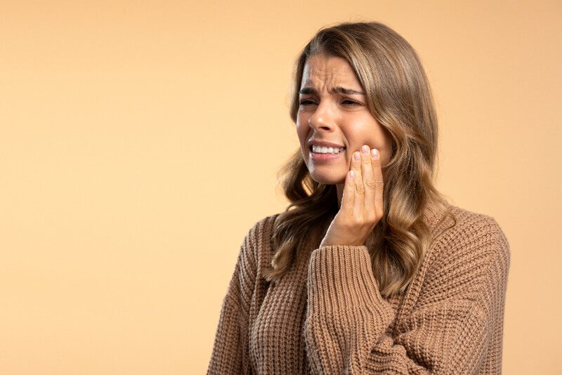 Quais as causas de um dente inflamado